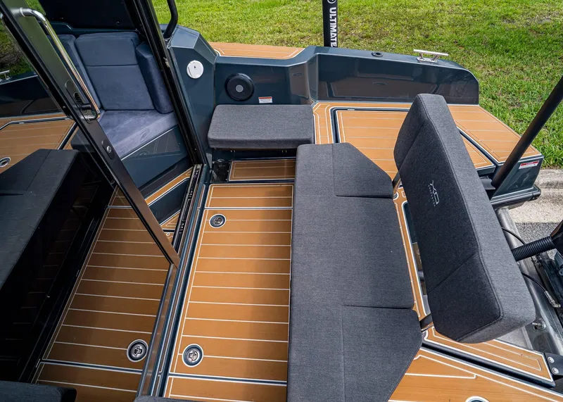 Slide: The Image of 2023 XO Boats EXPLR 9 interior with sleek seating and modern design. - 26