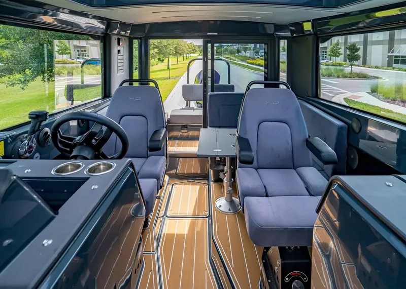 Slide: The Image of Interior of 2023 XO Boats EXPLR 9, featuring modern seating and sleek design. - 6