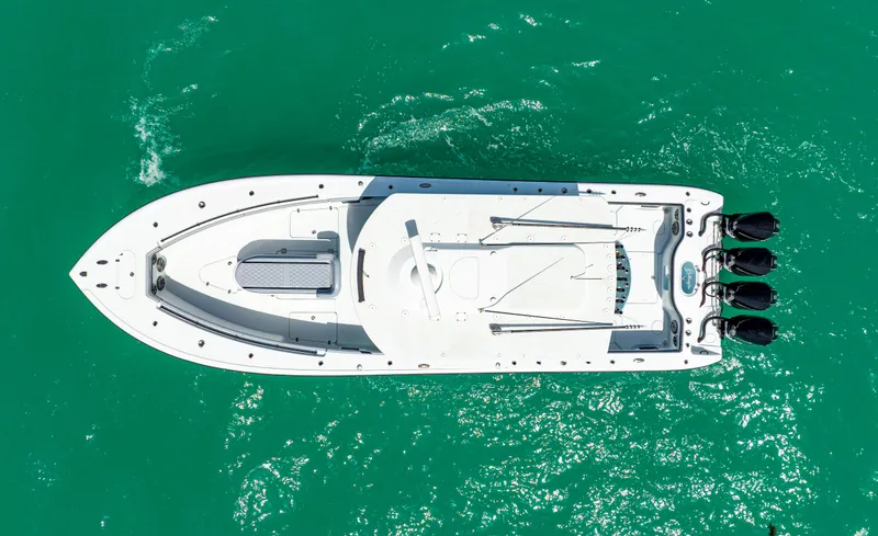 Slide: The Image of Aerial view of 2022 Yellowfin 39 boat on turquoise water. - 11