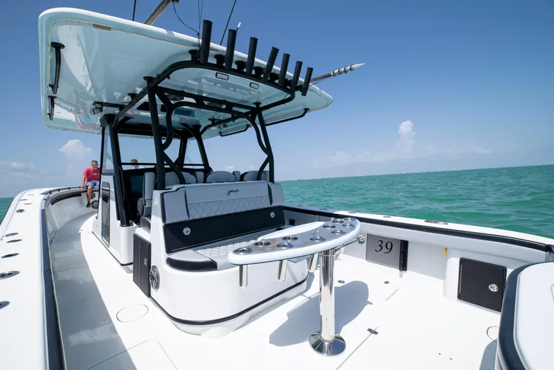Slide: The Image of 2022 Yellowfin 39 boat on open water, featuring sleek design and modern amenities. - 23