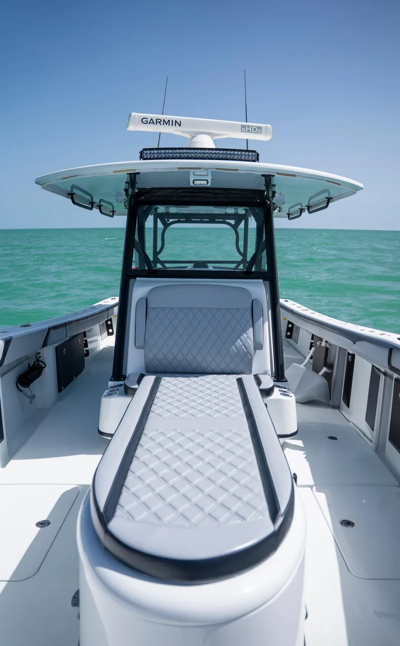 Slide: The Image of 2022 Yellowfin 39 boat with sleek design on open water. - 33