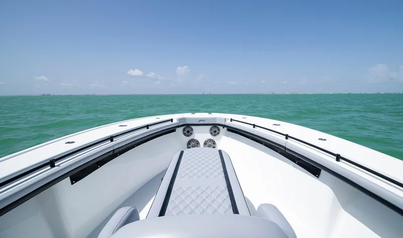 Slide: The Image of Bow view of 2022 Yellowfin 39 boat on open sea under clear sky. - 38