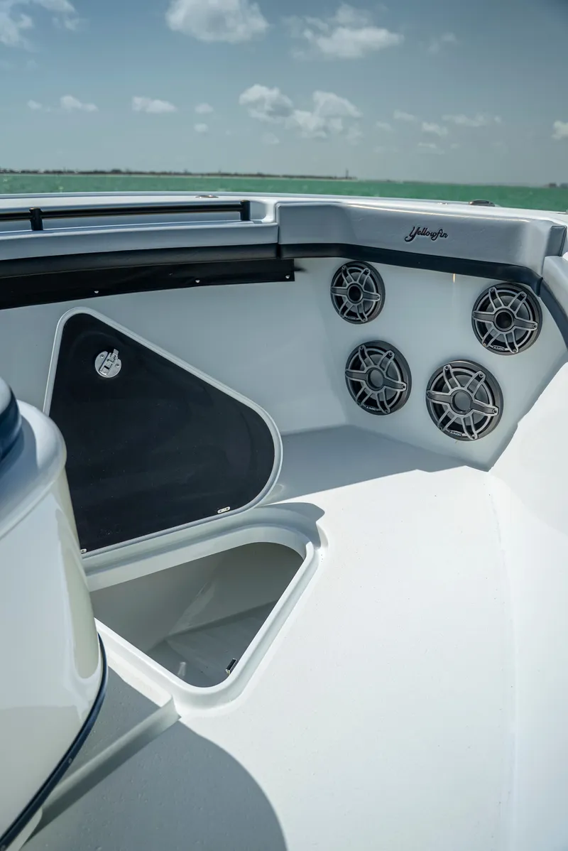 Slide: The Image of 2022 Yellowfin 39 boat interior with speakers and storage compartment. - 41