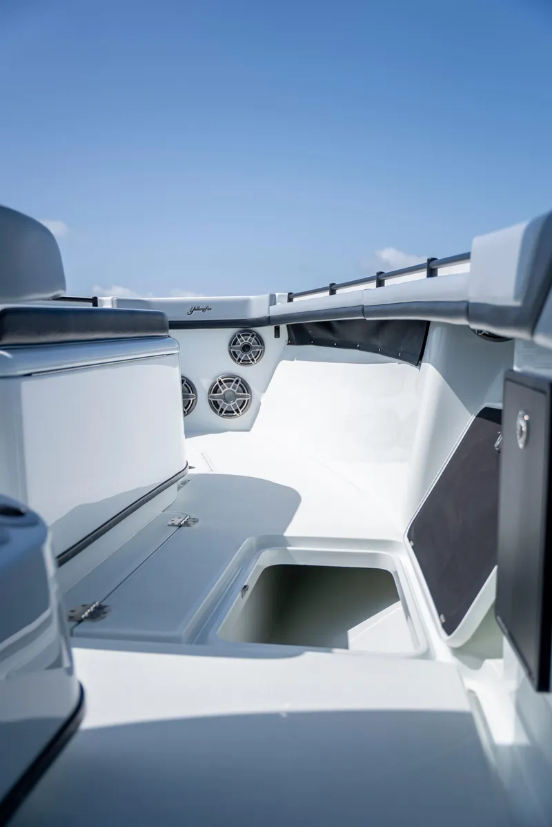 Slide: The Image of 2022 Yellowfin 39 boat interior with storage compartments and speakers. - 42