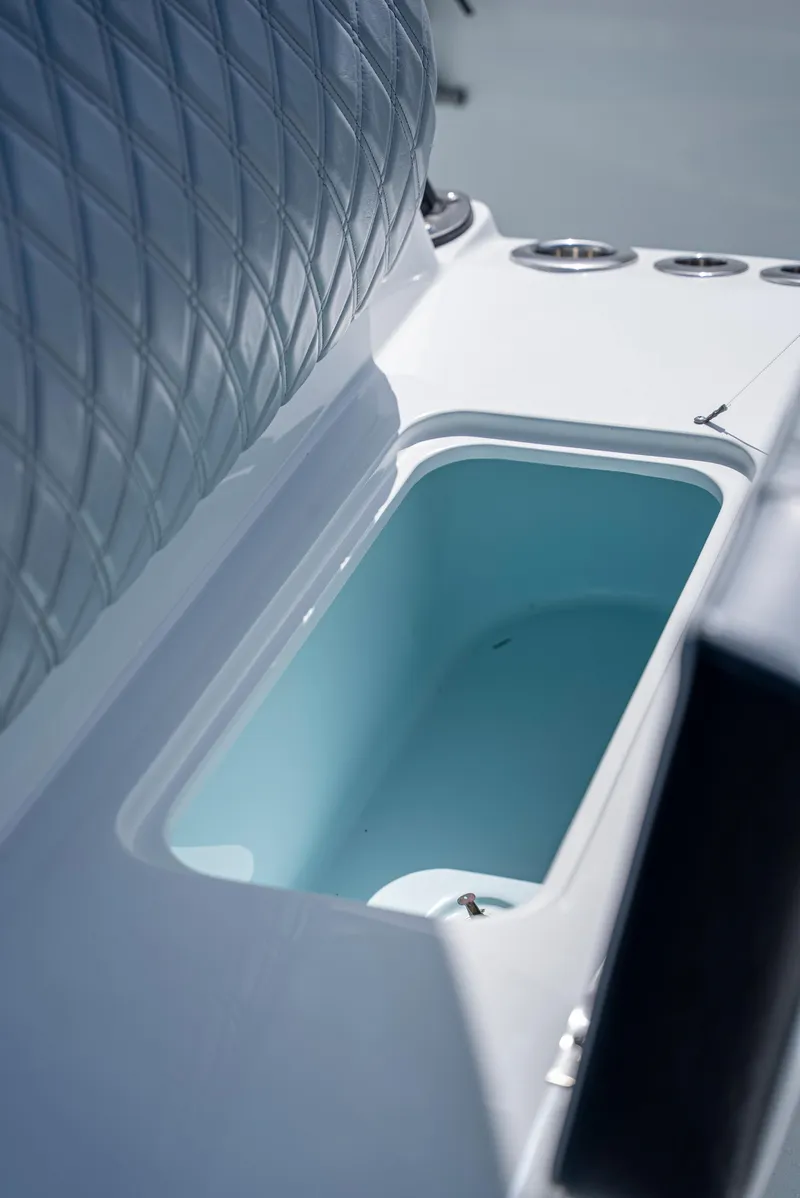 Slide: The Image of 2022 Yellowfin 39 boat interior with open storage compartment. - 44