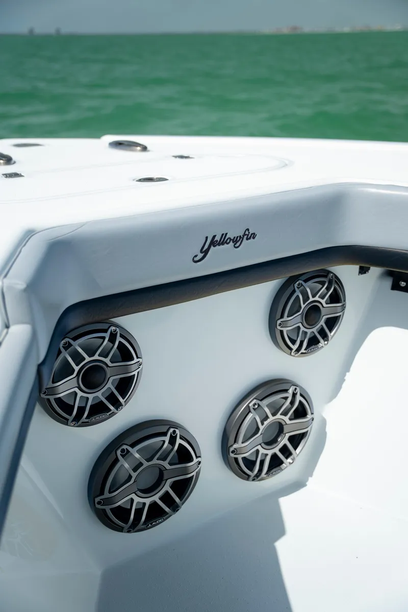 Slide: The Image of 2022 Yellowfin 39 boat speakers with ocean backdrop. - 47