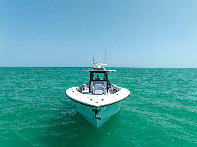 Slide: The Image of 2022 Yellowfin 39 boat on turquoise ocean under clear blue sky. - 5