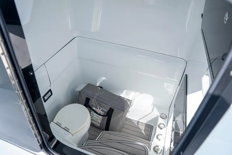 Slide: The Image of 2022 Yellowfin 39 boat interior with toilet and storage bag. - 55