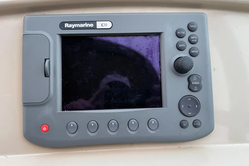 Slide: The Image of Raymarine C70 navigation system on 2004 Chaparral 290 Signature boat dashboard. - 12