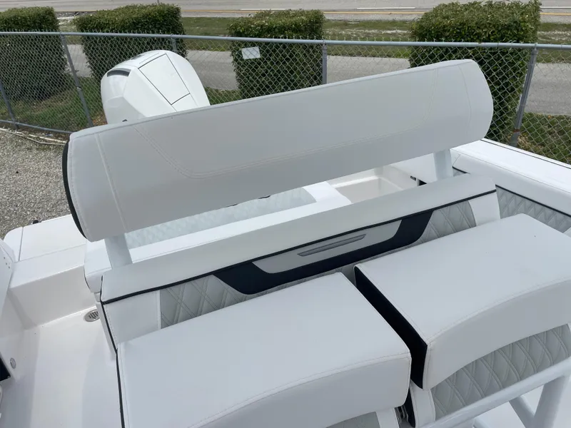 Slide: The Image of 2026 Blackfin 222CC boat seating with white upholstery and modern design. - 17