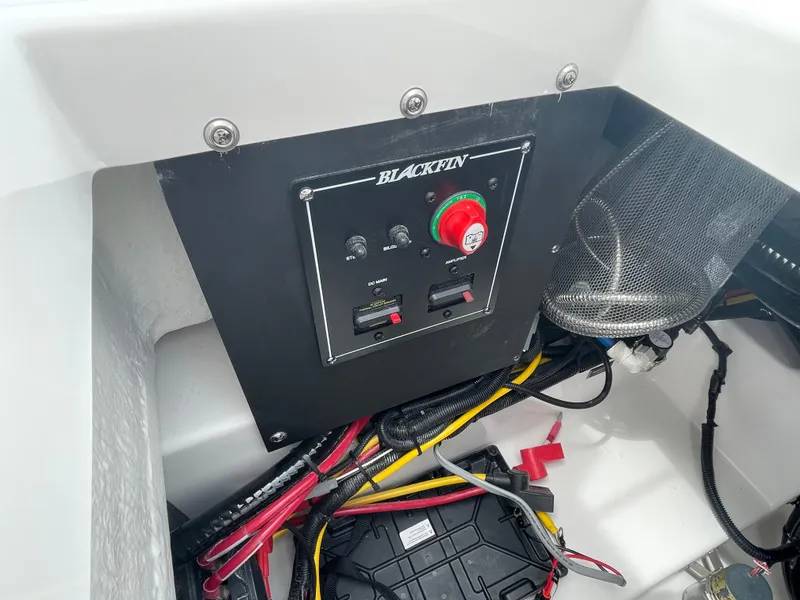 Slide: The Image of Control panel of 2026 Blackfin 222CC boat with wiring and switches. - 31