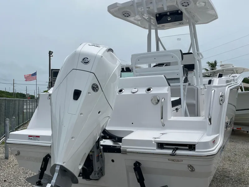 Slide: The Image of 2026 Blackfin 222CC boat with powerful outboard motor, sleek design, and modern features. - 4