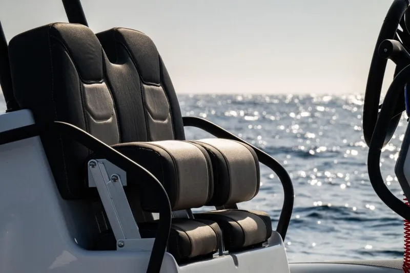Slide: The Image of 2025 Grand Inflatables G750 boat seats with ocean backdrop. - 4