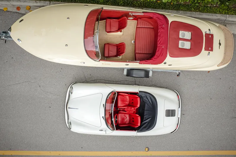 Slide: The Image of Overhead view of 2025 Seven Seas Yachts Venus Speedster and classic car, both with red interiors. - 7