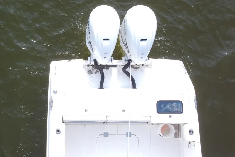 Slide: The Image of Overhead view of 2019 Everglades 335 Center Console boat with dual engines. - 22