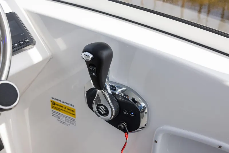 Slide: The Image of Throttle control of 2025 Sea Pro 240 Dual Console boat, featuring ergonomic design and modern controls. - 9