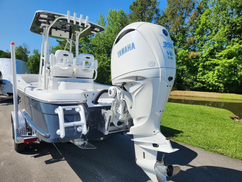 Slide: The Image of 2025 BlackJack 256 Coastal boat with Yamaha 350 outboard motor on a trailer. - 3