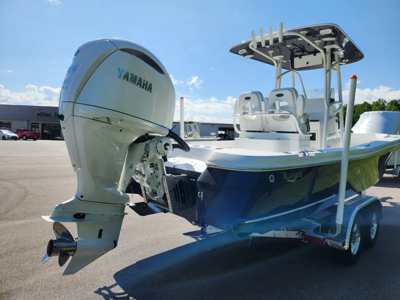 Slide: The Image of 2025 BlackJack 256 Coastal boat with Yamaha outboard engine on trailer. - 4