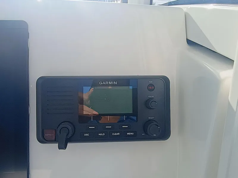 Slide: The Image of Garmin marine display on 2025 Regulator 23 Center Console boat dashboard. - 19