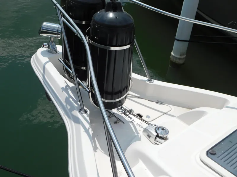 Slide: The Image of 2003 Regal 2860 Commodore boat deck with railing and equipment. - 10
