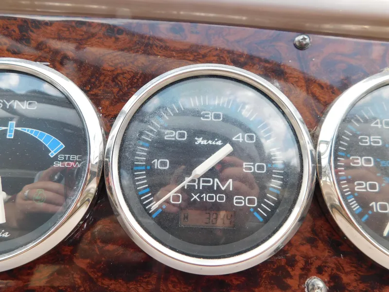 Slide: The Image of Close-up of 2003 Regal 2860 Commodore boat RPM gauge on dashboard. - 35