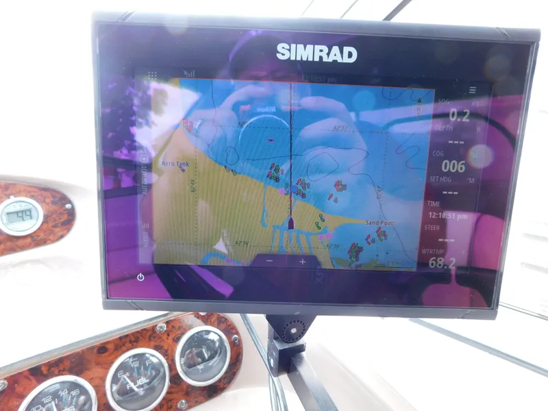 Slide: The Image of Simrad navigation display on 2003 Regal 2860 Commodore boat dashboard. - 39