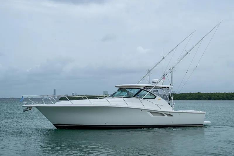 Slide: The Image of 2009 Tiara Yachts 39 Open boat on calm water, side view. - 1