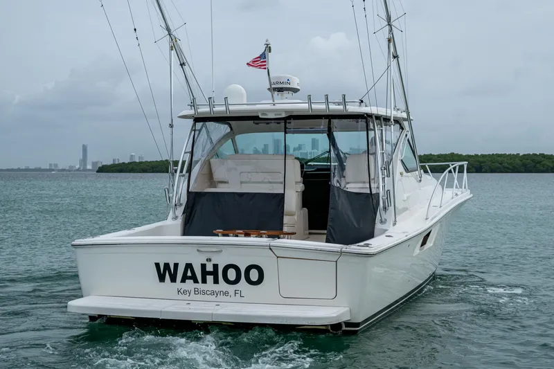 Slide: The Image of 2009 Tiara Yachts 39 Open boat named "WAHOO" in Key Biscayne, FL, on the water. - 10