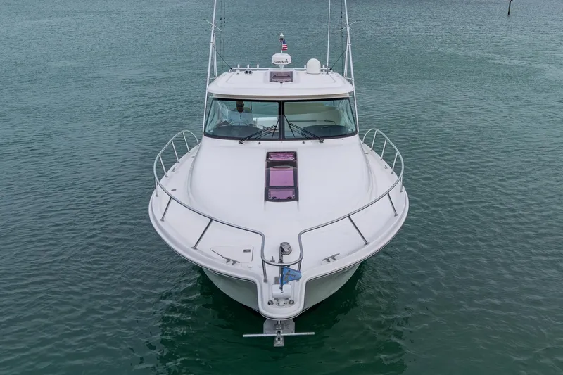 Slide: The Image of 2009 Tiara Yachts 39 Open boat on calm water, front view. - 22