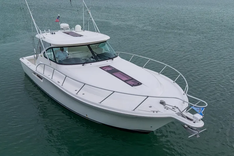 Slide: The Image of 2009 Tiara Yachts 39 Open cruising on calm waters. - 23