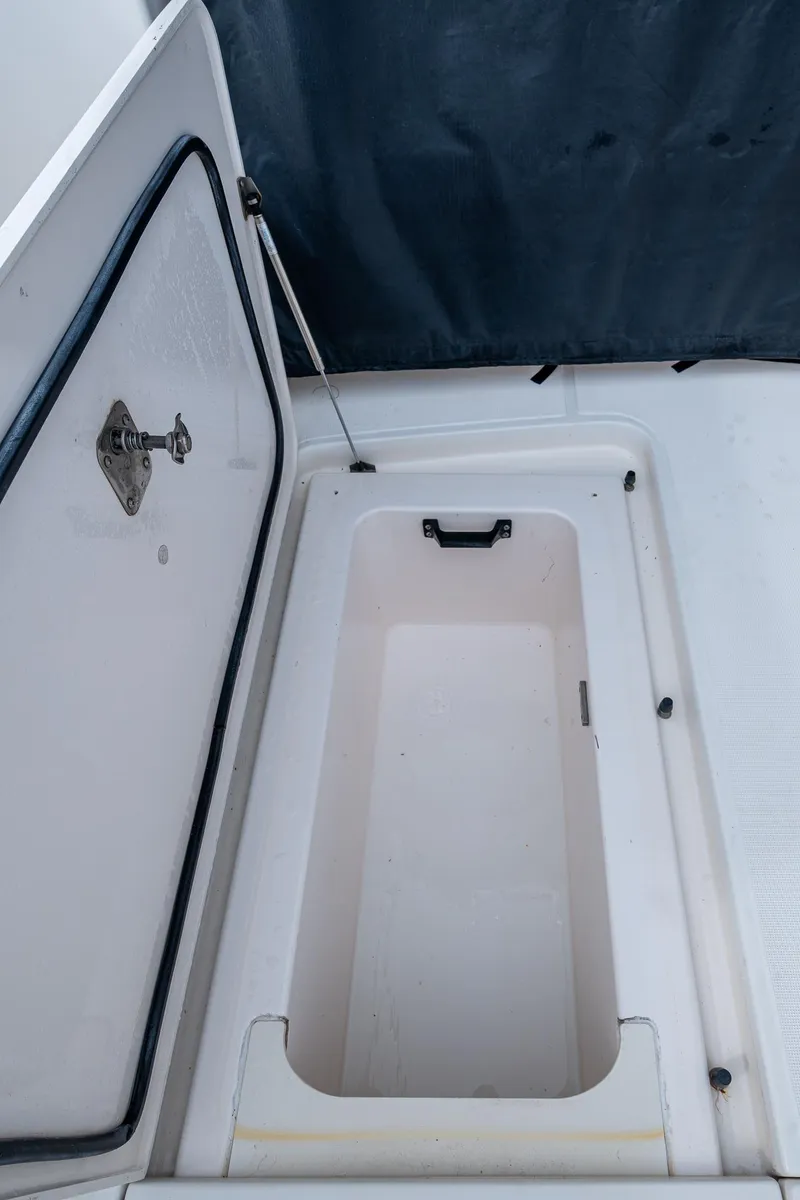 Slide: The Image of 2009 Tiara Yachts 39 Open storage compartment with open hatch. - 32