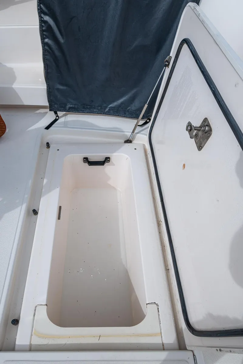 Slide: The Image of Open storage compartment on 2009 Tiara Yachts 39 Open boat. - 34