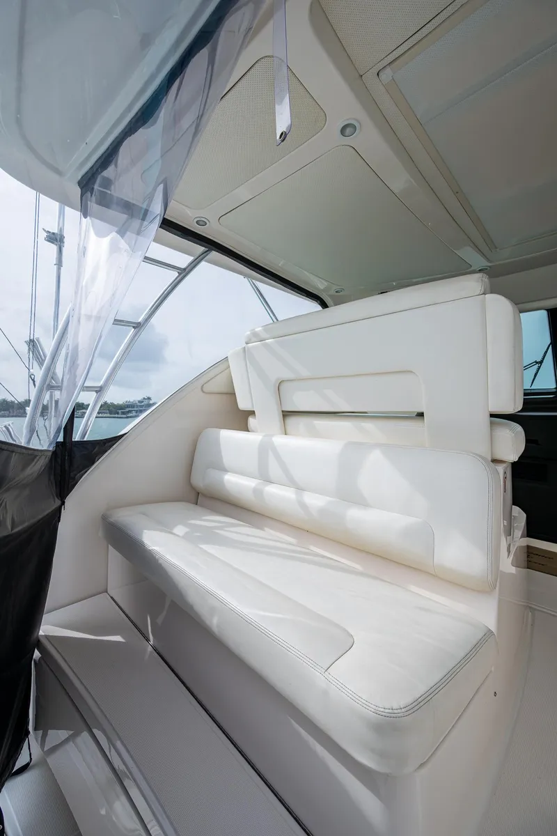Slide: The Image of 2009 Tiara Yachts 39 Open interior with white seating and modern design. - 38
