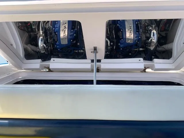 Slide: The Image of Engine compartment of a 2000 Donzi 38 ZX boat, showcasing dual engines. - 20