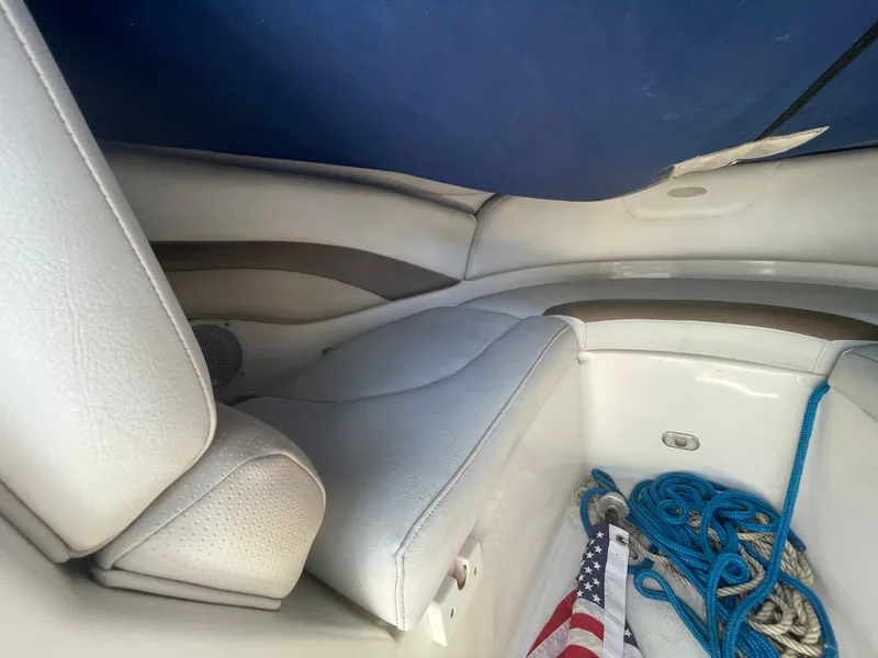 Slide: The Image of Interior of 2005 Chaparral 236SSi boat with seating and ropes. - 13