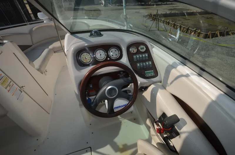 Slide: The Image of 2005 Chaparral 236SSi boat dashboard with steering wheel and instrument panel. - 5