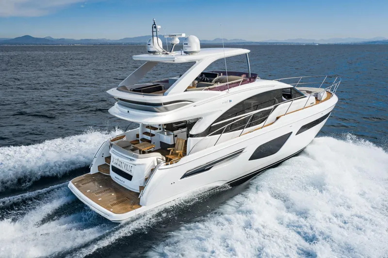 Slide: The Image of Luxurious 2022 Princess F55 yacht cruising on open sea, showcasing sleek design and elegance. - 14