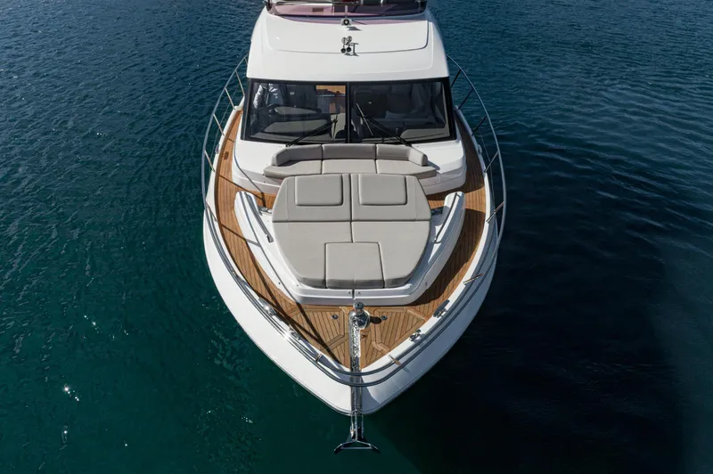Slide: The Image of Luxury Princess F55 yacht, 2022 model, with sleek design on calm blue water. - 17