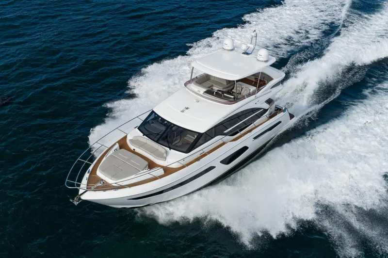 Slide: The Image of Luxurious 2022 Princess F55 yacht cruising on open water, showcasing sleek design and elegance. - 3