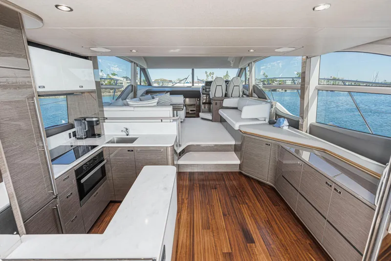 Slide: The Image of Luxurious interior of 2022 Princess F55 yacht with modern kitchen and seating area. - 43