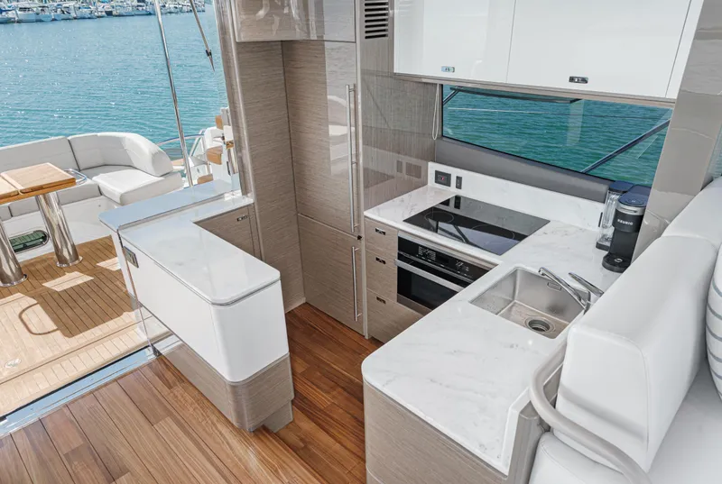 Slide: The Image of Luxurious 2022 Princess F55 yacht kitchen with modern appliances and elegant design. - 46