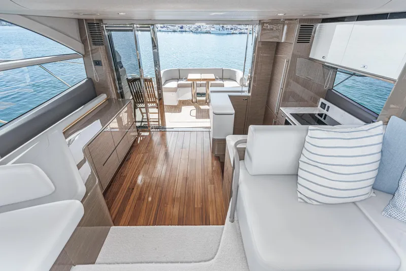 Slide: The Image of Luxurious interior of 2022 Princess F55 yacht with elegant seating and modern kitchen. - 48
