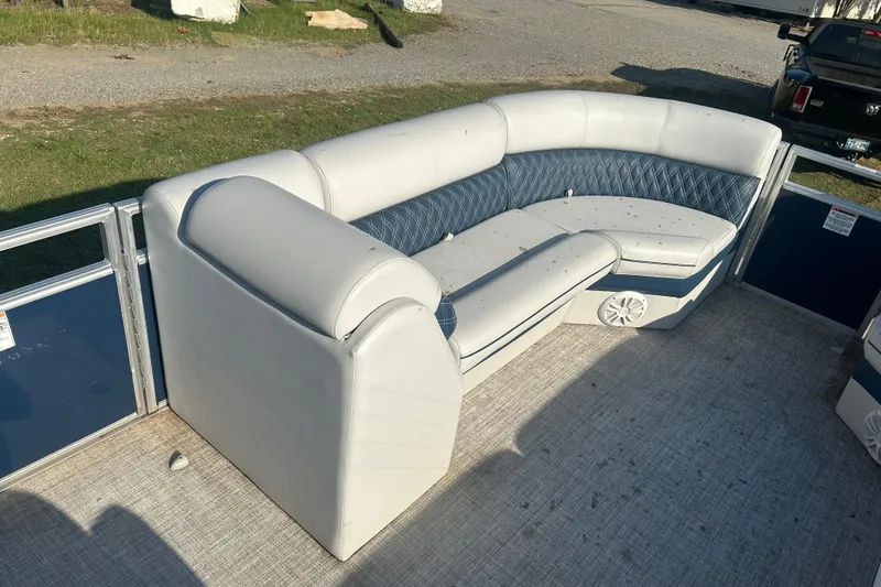 Slide: The Image of 2023 Nepallo 22TL Sport Toon pontoon boat with white and blue seating. - 13