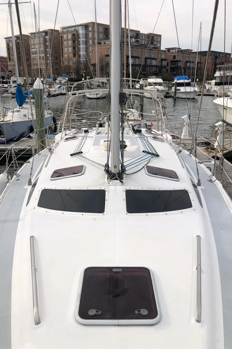 Slide: The Image of Sailboat deck view of 2000 Hunter 410 model docked at marina. - 26