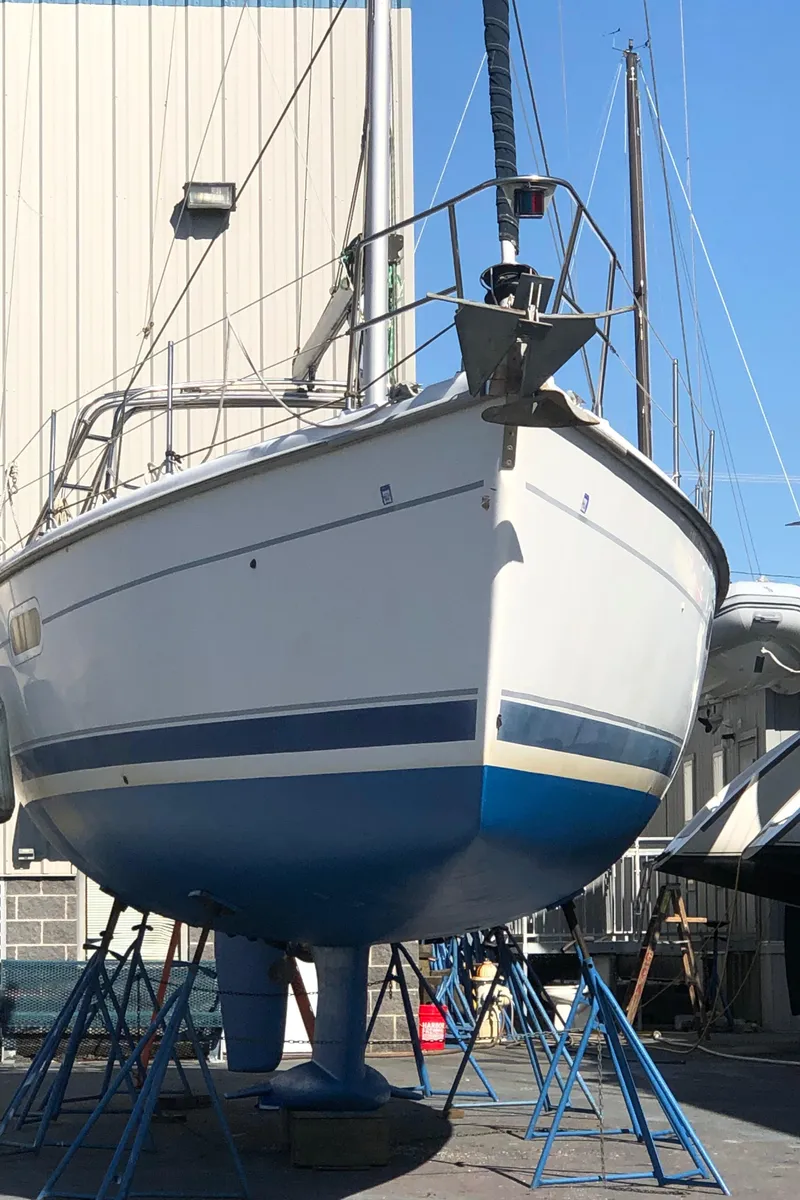 Slide: The Image of Sailboat Hunter 410, 2000 model, on stands in a boatyard. - 38