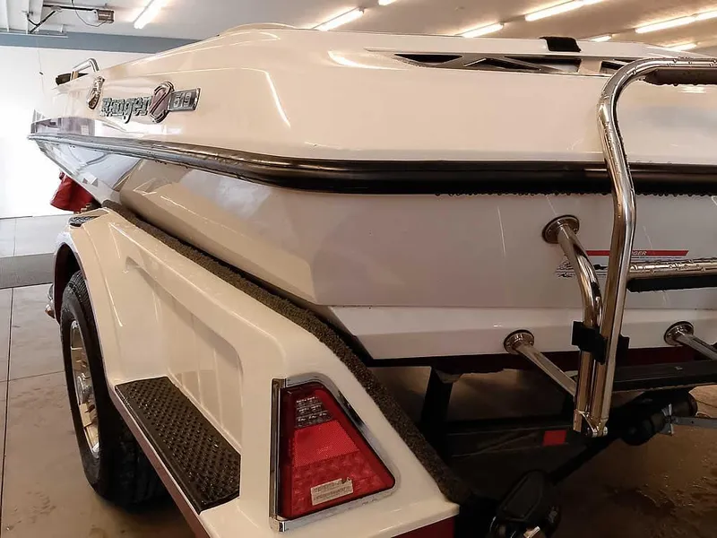 Slide: The Image of 2021 Ranger Z519 SC boat on trailer, rear view in indoor lighting. - 11
