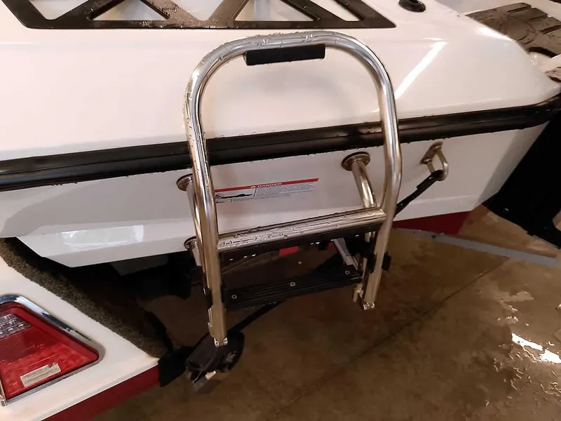 Slide: The Image of 2021 Ranger Z519 SC boat with a stainless steel boarding ladder. - 12