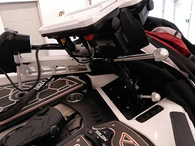 Slide: The Image of 2021 Ranger Z519 SC boat dashboard with advanced controls and navigation equipment. - 22