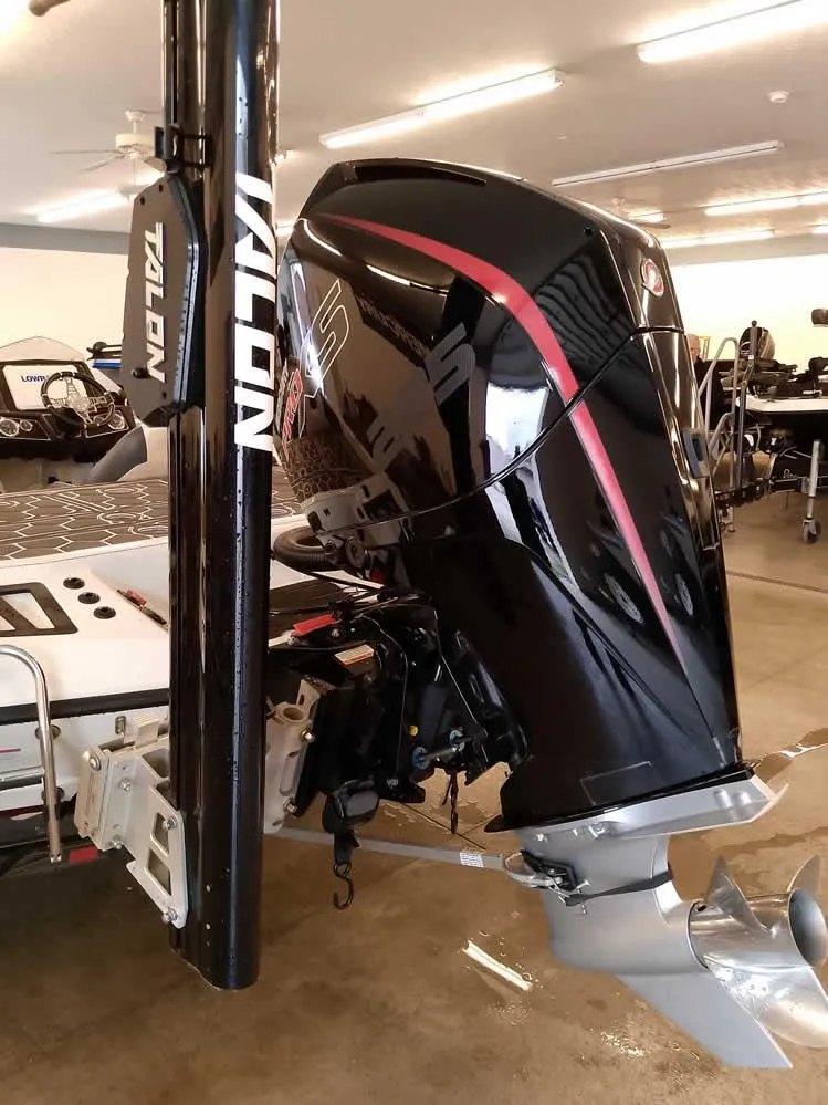 Slide: The Image of 2021 Ranger Z519 SC boat with Talon anchor and powerful outboard motor in showroom. - 3