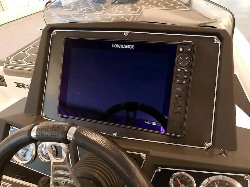 Slide: The Image of Dashboard of 2021 Ranger Z519 SC boat with Lowrance HDS display and steering wheel. - 33